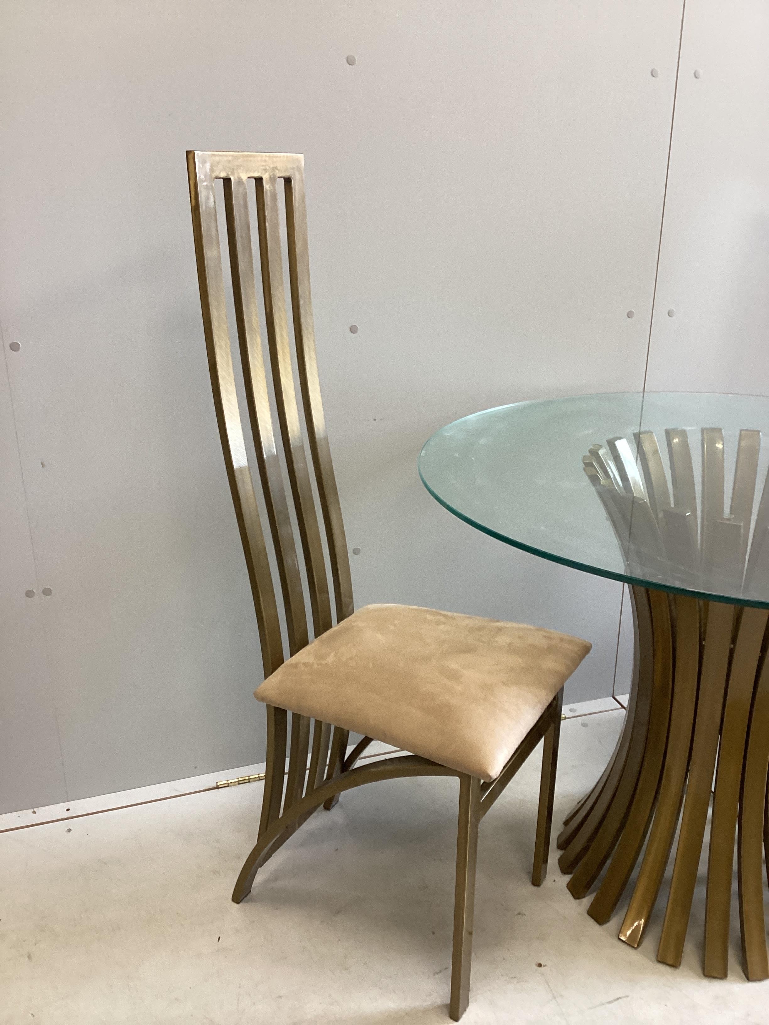 A Contemporary Italian design circular gilt metal glass top table, diameter 100cm, height 74cm, and two chairs